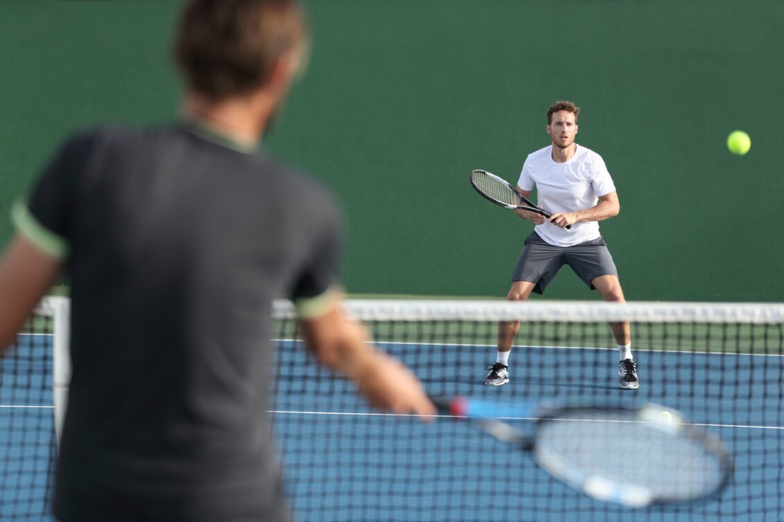 Men Playing Tennis